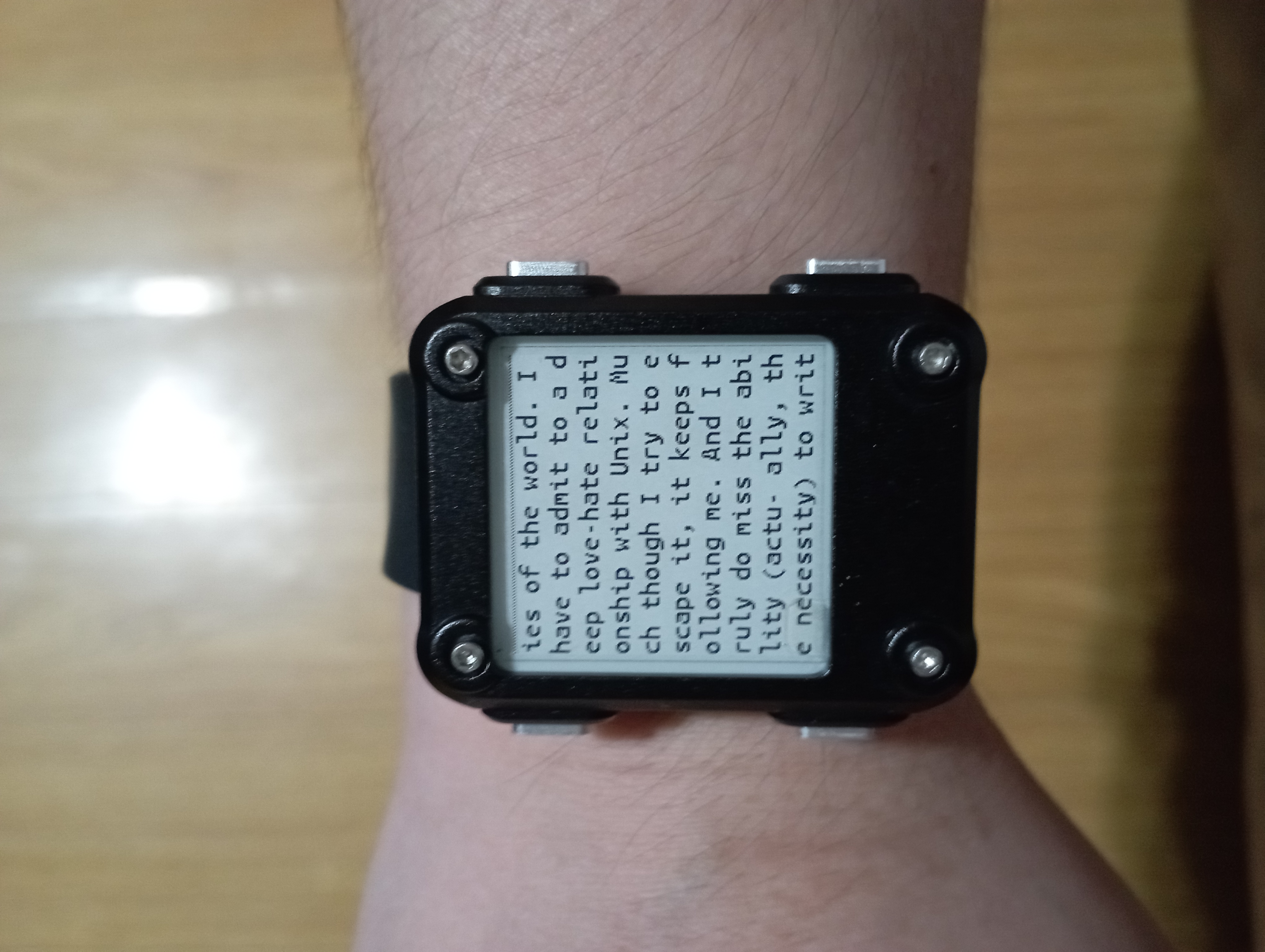 The UNIX-Hater's Handbook being read in InkWatchy while wearing the Watchy